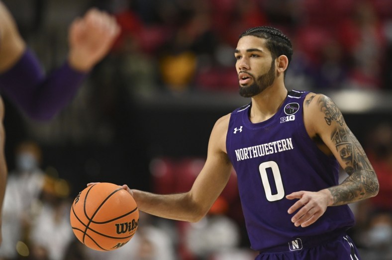 Dec 5, 2021; College Park, Maryland, USA;  Northwestern Wildcats guard Boo Buie (0) looks to pass during the first half against the Maryland Terrapins at Xfinity Center. Mandatory Credit: Tommy Gilligan-USA TODAY Sports