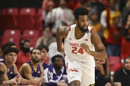 Dec 5, 2021; College Park, Maryland, USA; Maryland Terrapins forward Donta Scott (24) runs down the court during the first half against the Northwestern Wildcats  at Xfinity Center. Mandatory Credit: Tommy Gilligan-USA TODAY Sports