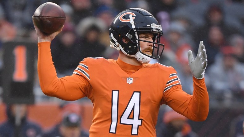 Dec 5, 2021; Chicago, Illinois, USA; Chicago Bears quarterback Andy Dalton (14) passes the football in the first half against the Arizona Cardinals at Soldier Field. Mandatory Credit: Quinn Harris-USA TODAY Sports