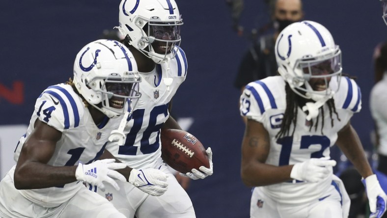 Dec 5, 2021; Houston, Texas, USA; Indianapolis Colts wide receiver Ashton Dulin (16) celebrates a touchdown against the Houston Texans in the second quarter at NRG Stadium. Mandatory Credit: Thomas Shea-USA TODAY Sports