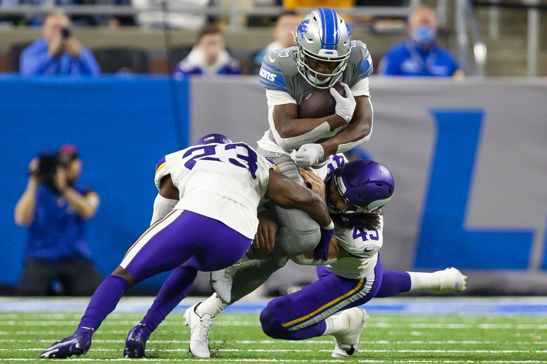 Minnesota Vikings vs Detroit Lions Detroit Lions running back Godwin  Igwebuike (35) runs the ball