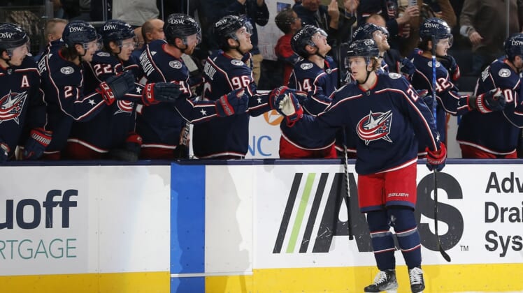 Dec 5, 2021; Columbus, Ohio, USA; Columbus Blue Jackets defenseman Adam Boqvist (27) celebrates a goal against the San Jose Sharks  during the first period at Nationwide Arena. Mandatory Credit: Russell LaBounty-USA TODAY Sports