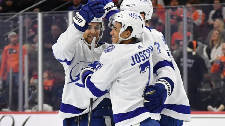 Dec 5, 2021; Philadelphia, Pennsylvania, USA; Tampa Bay Lightning right wing Mathieu Joseph (7) celebrates his shorthanded goal with defenseman Jan Rutta (44) and defenseman Victor Hedman (77) against the Philadelphia Flyers during the second period at Wells Fargo Center. Mandatory Credit: Eric Hartline-USA TODAY Sports