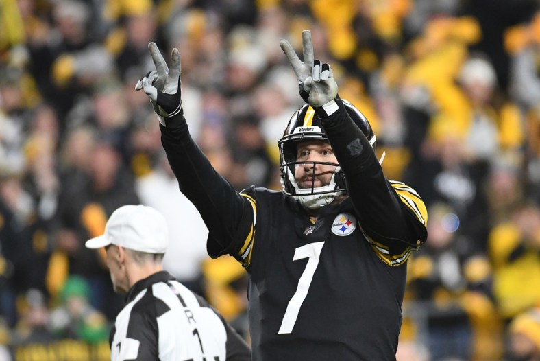 Dec 5, 2021; Pittsburgh, Pennsylvania, USA;  Pittsburgh Steelers quarterback Ben Roethlisberger (7) signals they will go for two points against the Baltimore Ravens during the fourth quarter at Heinz Field. They converted and won the game 20-19. Mandatory Credit: Philip G. Pavely-USA TODAY Sports