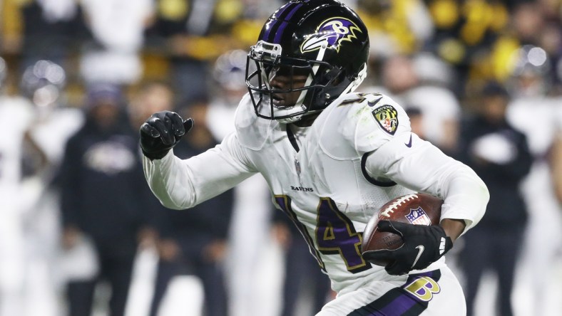 Dec 5, 2021; Pittsburgh, Pennsylvania, USA;  Baltimore Ravens wide receiver Sammy Watkins (14) runs after a catch against the Pittsburgh Steelers during the fourth quarter at Heinz Field.Pittsburgh won 20-19.  Mandatory Credit: Charles LeClaire-USA TODAY Sports