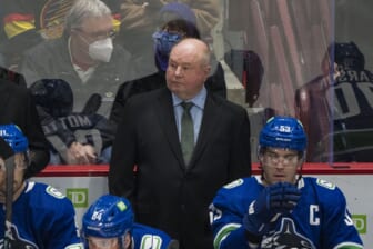 Dec 6, 2021; Vancouver, British Columbia, CAN; Vancouver Canucks head coach Bruce Boudreau on the bench during a game against the Los Angeles Kings in the first period at Rogers Arena. Mandatory Credit: Bob Frid-USA TODAY Sports