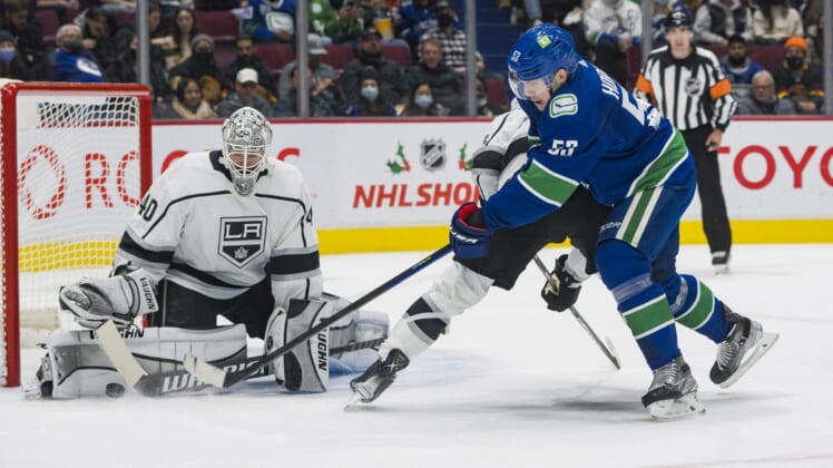 Dec 6, 2021; Vancouver, British Columbia, CAN; Los Angeles Kings goalie Cal Petersen (40) makes a save on Vancouver Canucks forward Bo Horvat (53) in the first period at Rogers Arena. Mandatory Credit: Bob Frid-USA TODAY Sports