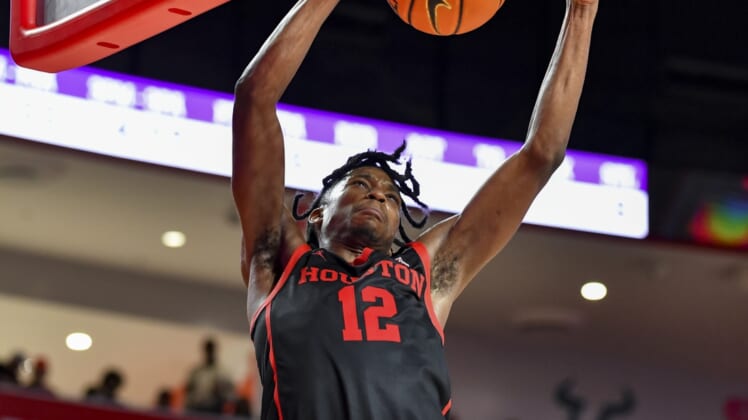 Dec 6, 2021; Houston, Texas, USA;  Houston Cougars guard Tramon Mark (12) slam dunk the ball during the second half against the Alcorn State Braves at Fertitta Center. Mandatory Credit: Maria Lysaker-USA TODAY Sports