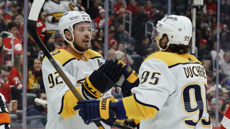 Dec 7, 2021; Detroit, Michigan, USA;  Nashville Predators center Ryan Johansen (92) receives congratulations from center Matt Duchene (95) after scoring in the first period against the Detroit Red Wings in the first period at Little Caesars Arena. Mandatory Credit: Rick Osentoski-USA TODAY Sports