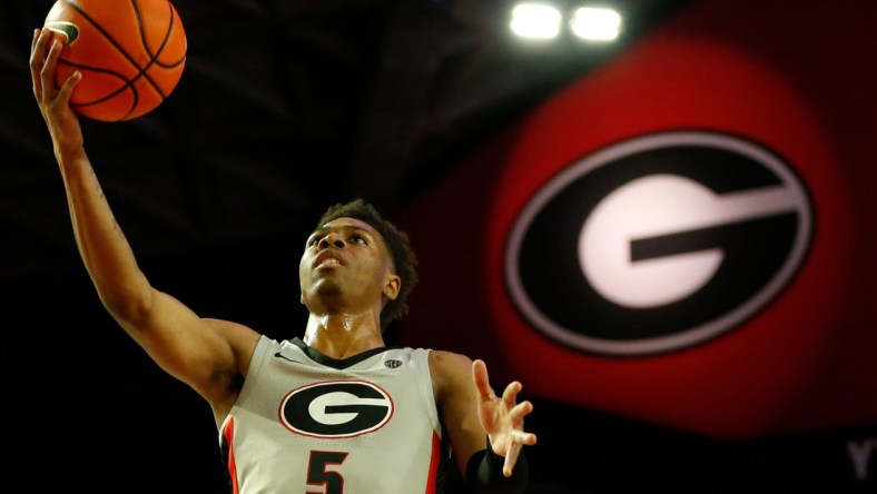 Georgia's Christian Wright (5) takes a shot during an NCAA basketball game between Jacksonville and Georgia in Athens, Ga., on Tuesday, Dec. 7, 2021. Georgia won 69-58.