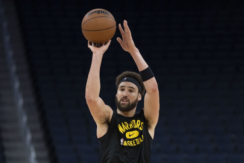 December 8, 2021; San Francisco, California, USA; Golden State Warriors guard Klay Thompson (11) shoots the basketball before the game against the Portland Trail Blazers at Chase Center. Mandatory Credit: Kyle Terada-USA TODAY Sports