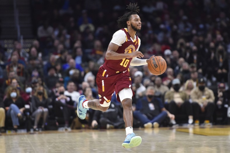 Dec 8, 2021; Cleveland, Ohio, USA; Cleveland Cavaliers guard Darius Garland (10) brings the ball up court in the second quarter against the Chicago Bulls at Rocket Mortgage FieldHouse. Mandatory Credit: David Richard-USA TODAY Sports