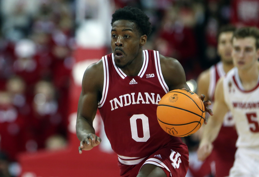 Dec 8, 2021; Madison, Wisconsin, USA; Indiana Hoosiers guard Xavier Johnson (0) drives the ball up the court during the game with the Wisconsin Badgers at the Kohl Center. Mandatory Credit: Mary Langenfeld-USA TODAY Sports