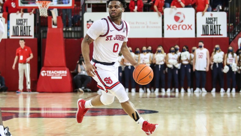 Dec 5, 2021; Queens, New York, USA;  St. John   s Red Storm guard Posh Alexander (0) at Carnesecca Arena. Mandatory Credit: Wendell Cruz-USA TODAY Sports