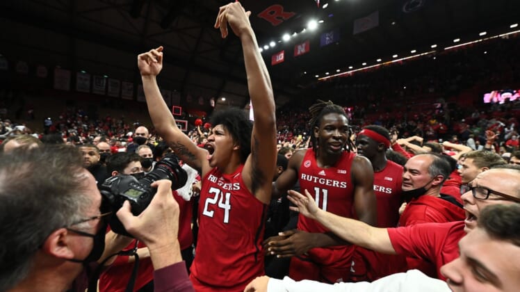 Dec 9, 2021; Piscataway, New Jersey, USA; Rutgers Scarlet Knights guard Ron Harper Jr. (24) celebrates with Rutgers Scarlet Knights center Clifford Omoruyi (11) after defeating the top ranked Purdue Boilermakers 70-69 at Jersey Mike's Arena. Mandatory Credit: Catalina Fragoso-USA TODAY Sports
