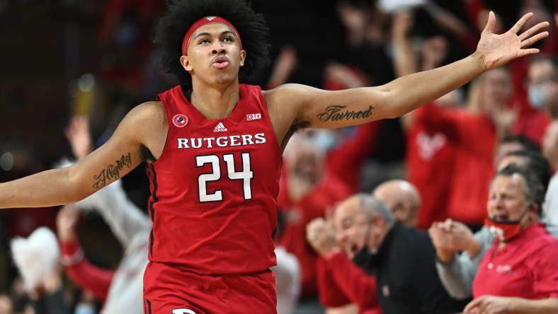 Dec 9, 2021; Piscataway, New Jersey, USA; Rutgers Scarlet Knights guard Ron Harper Jr. (24) reacts against the Purdue Boilermakers during the first half at Jersey Mike's Arena. Mandatory Credit: Catalina Fragoso-USA TODAY Sports