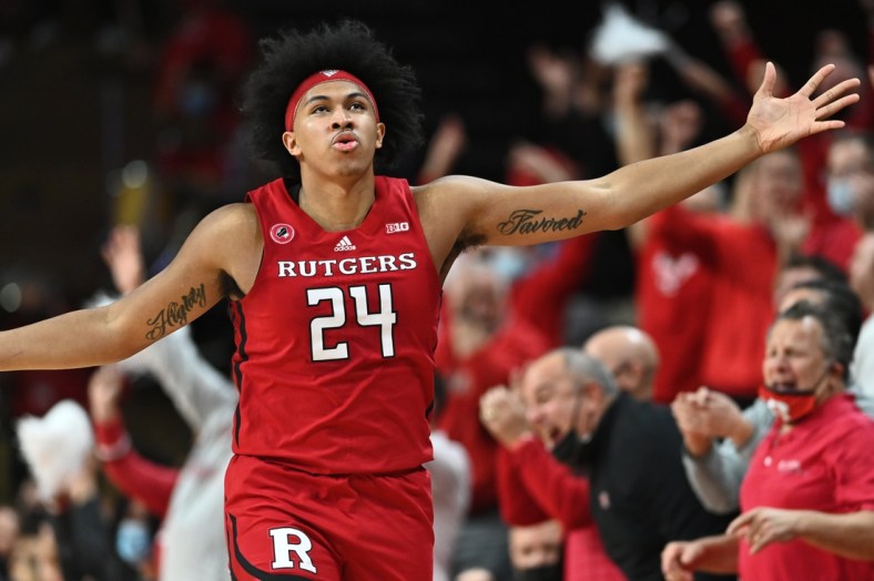 Dec 9, 2021; Piscataway, New Jersey, USA; Rutgers Scarlet Knights guard Ron Harper Jr. (24) reacts against the Purdue Boilermakers during the first half at Jersey Mike's Arena. Mandatory Credit: Catalina Fragoso-USA TODAY Sports