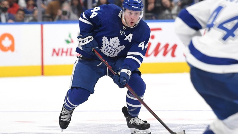 Dec 9, 2021; Toronto, Ontario, CAN; Toronto Maple Leafs defenseman Morgan Rielly (44) skates with the puck against Tampa Bay Lightning in the third period at Scotiabank Arena. Mandatory Credit: Dan Hamilton-USA TODAY Sports