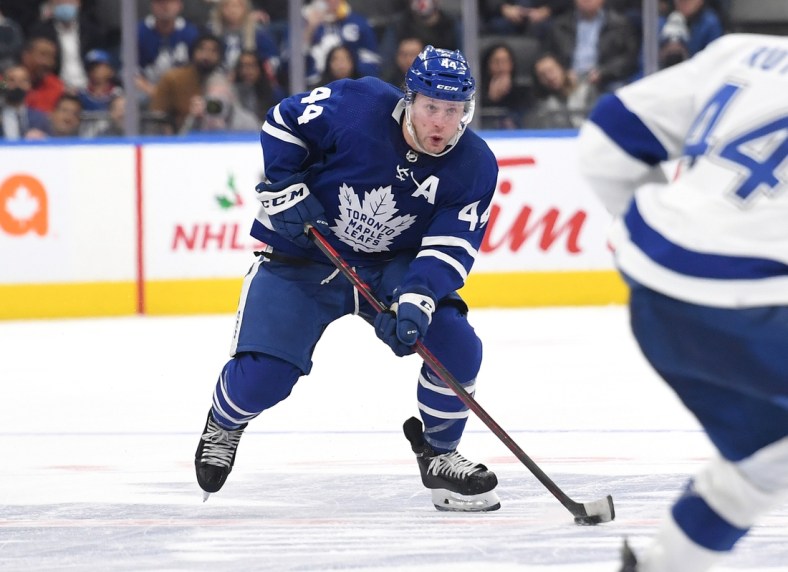 Dec 9, 2021; Toronto, Ontario, CAN; Toronto Maple Leafs defenseman Morgan Rielly (44) skates with the puck against Tampa Bay Lightning in the third period at Scotiabank Arena. Mandatory Credit: Dan Hamilton-USA TODAY Sports