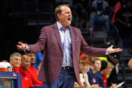 Dec 4, 2021; Oxford, Mississippi, USA; Mississippi Rebels head coach Kermit Davis reacts to a call during the second half against the Memphis Tigers at The Sandy and John Black Pavilion at Ole Miss. Mandatory Credit: Petre Thomas-USA TODAY Sports