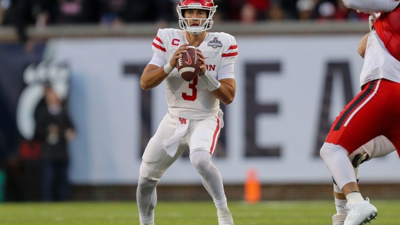 Dec 4, 2021; Cincinnati, Ohio, USA; Houston Cougars quarterback Clayton Tune (3) plays the field against the Cincinnati Bearcats in the first half during the American Athletic Conference championship game at Nippert Stadium. Mandatory Credit: Katie Stratman-USA TODAY Sports