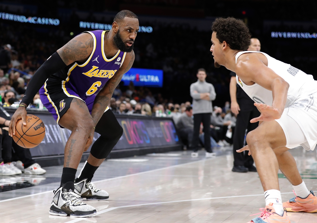 Dec 10, 2021; Oklahoma City, Oklahoma, USA; Oklahoma City Thunder forward Jeremiah Robinson-Earl (50) defends Los Angeles Lakers forward LeBron James (6) during the second quarter at Paycom Center. Mandatory Credit: Alonzo Adams-USA TODAY Sports