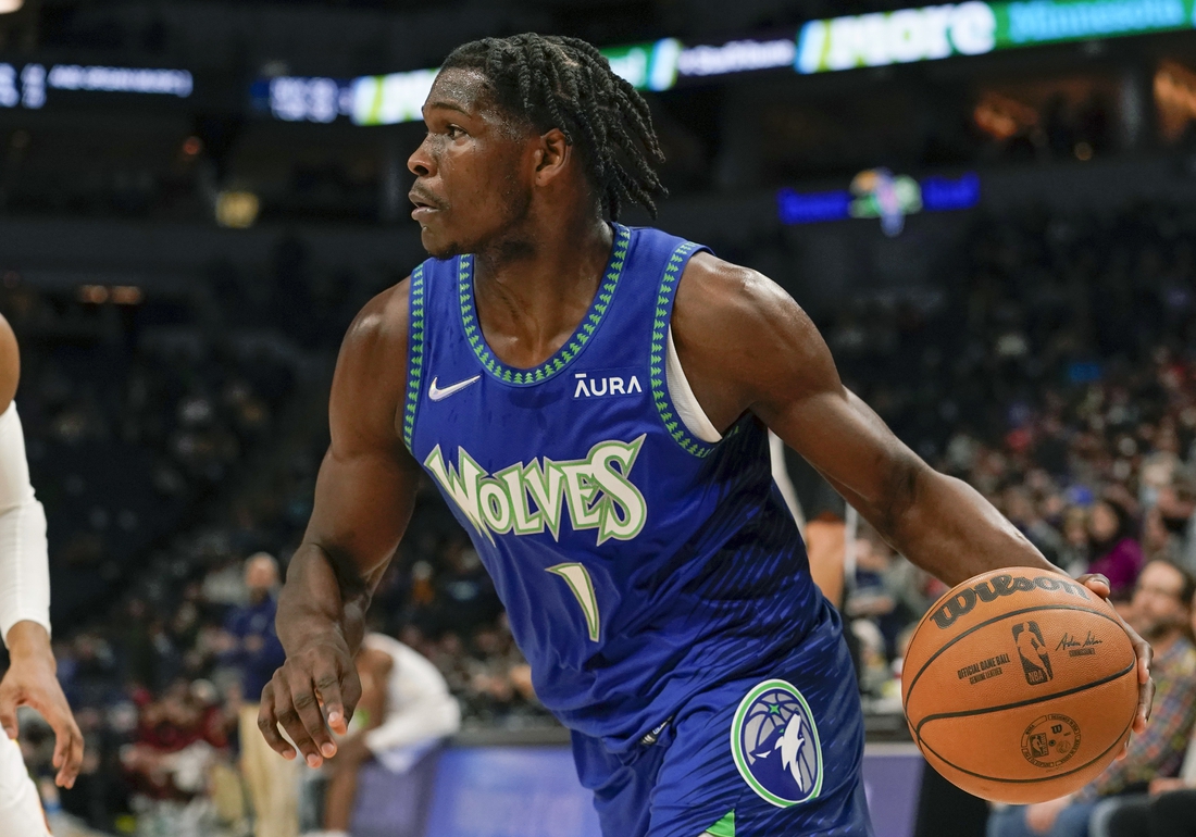 Dec 10, 2021; Minneapolis, Minnesota, USA;  Minnesota Timberwolves forward Anthony Edwards (1) moves against the Cleveland Cavaliers during the second quarter at Target Center. Mandatory Credit: Nick Wosika-USA TODAY Sports

