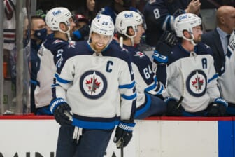 Dec 10, 2021; Vancouver, British Columbia, CAN; Winnipeg Jets forward Blake Wheeler (26) celebrate his goal against the Vancouver Canucks in the first period at Rogers Arena. Mandatory Credit: Bob Frid-USA TODAY Sports