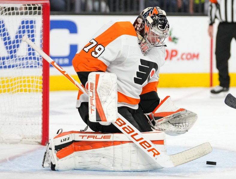 Dec 10, 2021; Las Vegas, Nevada, USA; Philadelphia Flyers goaltender Carter Hart (79) makes a second period save against the Vegas Golden Knights at T-Mobile Arena. Mandatory Credit: Stephen R. Sylvanie-USA TODAY Sports