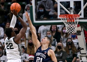Dec 11, 2021; East Lansing, Michigan, USA;  Michigan State Spartans center Mady Sissoko (22) shoots over Penn State Nittany Lions forward John Harrar (21) in the first half at Jack Breslin Student Events Center. Mandatory Credit: Dale Young-USA TODAY Sports