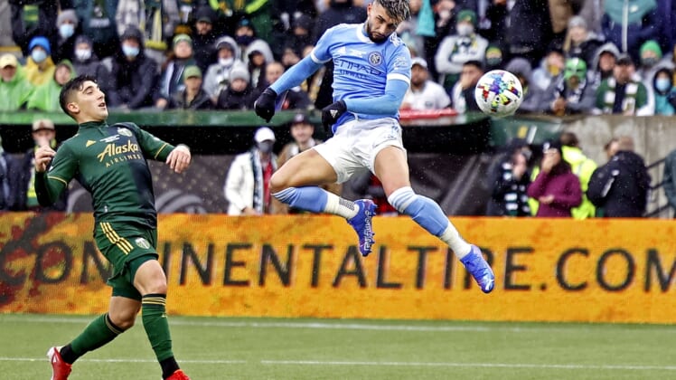 Dec 11, 2021; Portland, OR, USA; New York City FC midfielder Valentin Castellanos (11)  scores a goal during the first half against the Portland Timbers the 2021 MLS Cup championship game at Providence Park. Mandatory Credit: Soobum Im-USA TODAY Sports