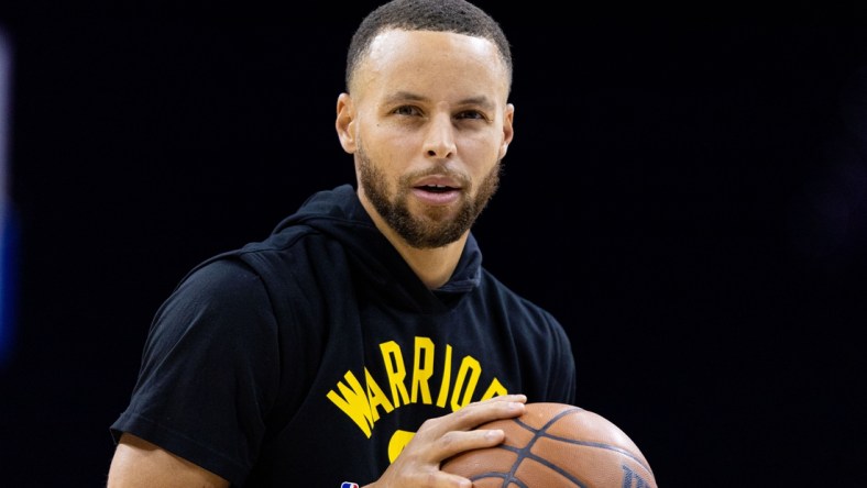 Dec 11, 2021; Philadelphia, Pennsylvania, USA; Golden State Warriors guard Stephen Curry warms up before a game against the Philadelphia 76ers at Wells Fargo Center. Mandatory Credit: Bill Streicher-USA TODAY Sports