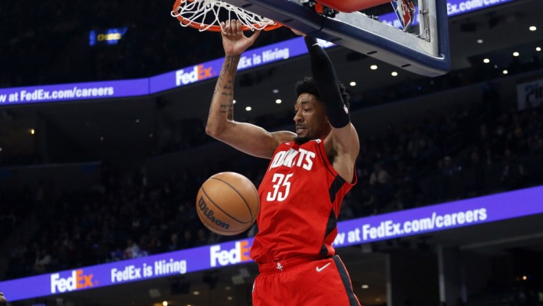 Dec 11, 2021; Memphis, Tennessee, USA; Houston Rockets forward Christian Wood (35) dunks during the first half against the Memphis Grizzles at FedExForum. Mandatory Credit: Petre Thomas-USA TODAY Sports