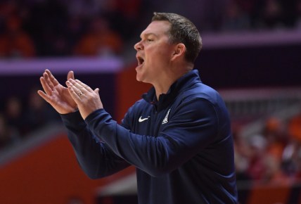 Dec 11, 2021; Champaign, Illinois, USA;  Arizona Wildcats head coach Tommy Lloyd directs his players during the first half against the Illinois fighting Illini at State Farm Center. Mandatory Credit: Ron Johnson-USA TODAY Sports