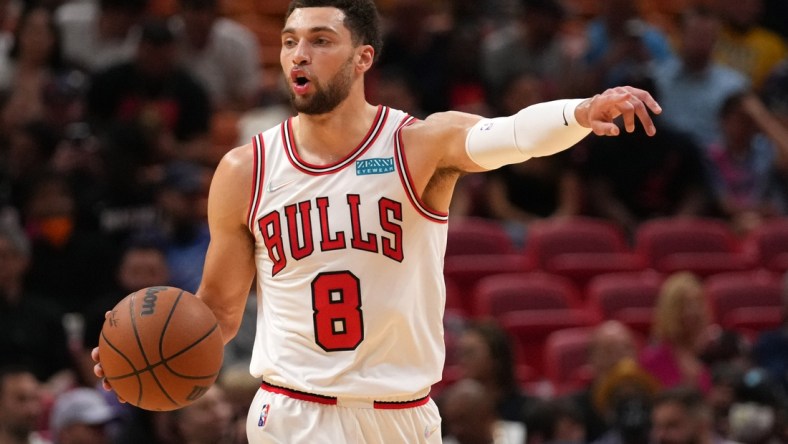 Dec 11, 2021; Miami, Florida, USA; Chicago Bulls guard Zach LaVine (8) dribbles the ball up the court against the Miami Heat during the first half at FTX Arena. Mandatory Credit: Jasen Vinlove-USA TODAY Sports