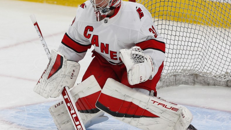 Dec 11, 2021; Edmonton, Alberta, CAN; Carolina Hurricanes goaltender Frederik Andersen (31) makes a save during warmup against the Edmonton Oilers at Rogers Place. Mandatory Credit: Perry Nelson-USA TODAY Sports