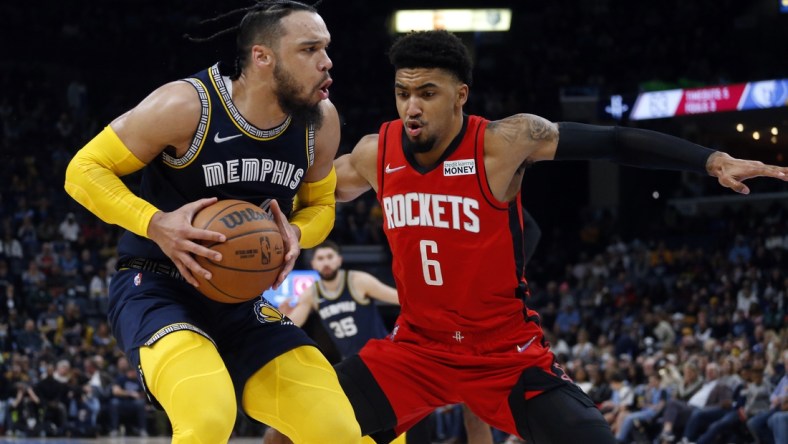 Dec 11, 2021; Memphis, Tennessee, USA; Memphis Grizzles guard Dillon Brooks (24) drives to the basket as Houston Rockets forward Kenyon Martin Jr. (6) defends during the second half at FedExForum. Mandatory Credit: Petre Thomas-USA TODAY Sports