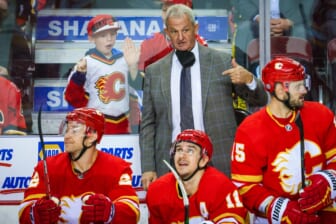 Dec 11, 2021; Calgary, Alberta, CAN; Calgary Flames head coach Darryl Sutter on his bench against the Boston Bruins during the third period at Scotiabank Saddledome. Mandatory Credit: Sergei Belski-USA TODAY Sports
