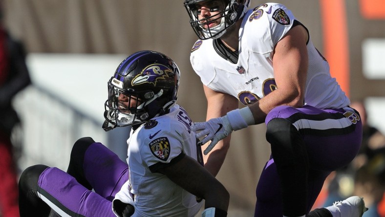 Baltimore Ravens quarterback Lamar Jackson (8) sits on the ground after an injury during the first half of an NFL football game at FirstEnergy Stadium, Sunday, Dec. 12, 2021, in Cleveland, Ohio. [Jeff Lange/Beacon Journal]

Browns 3