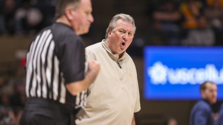 Dec 12, 2021; Morgantown, West Virginia, USA; West Virginia Mountaineers head coach Bob Huggins argues a call during the first half against the Kent State Golden Flashes at WVU Coliseum. Mandatory Credit: Ben Queen-USA TODAY Sports