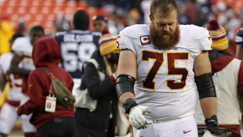 Dec 12, 2021; Landover, Maryland, USA; Washington Football Team guard Brandon Scherff (75) walks off the field after the game against the Dallas Cowboys at FedExField. Mandatory Credit: Geoff Burke-USA TODAY Sports