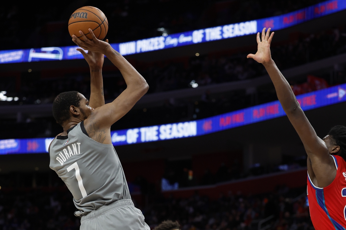 Dec 12, 2021; Detroit, Michigan, USA; Brooklyn Nets forward Kevin Durant (7) shoots in the first half against the Detroit Pistons at Little Caesars Arena. Mandatory Credit: Rick Osentoski-USA TODAY Sports