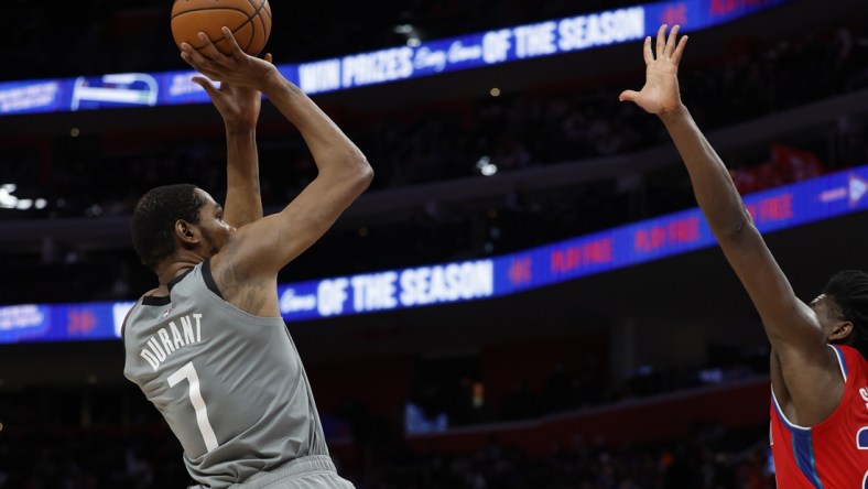 Dec 12, 2021; Detroit, Michigan, USA; Brooklyn Nets forward Kevin Durant (7) shoots in the first half against the Detroit Pistons at Little Caesars Arena. Mandatory Credit: Rick Osentoski-USA TODAY Sports