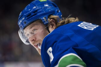 Dec 12, 2021; Vancouver, British Columbia, CAN; Vancouver Canucks forward Brock Boeser (6) smiles during a stop in play against the Carolina Hurricanes in the first period at Rogers Arena. Mandatory Credit: Bob Frid-USA TODAY Sports