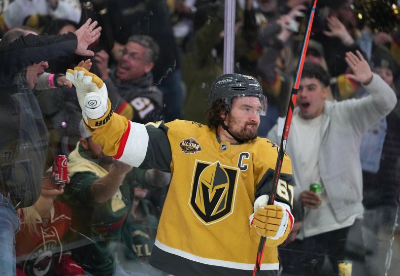 Dec 12, 2021; Las Vegas, Nevada, USA;  Vegas Golden Knights right wing Mark Stone (61) celebrates after scoring a third period goal against the Minnesota Wild at T-Mobile Arena. Mandatory Credit: Stephen R. Sylvanie-USA TODAY Sports