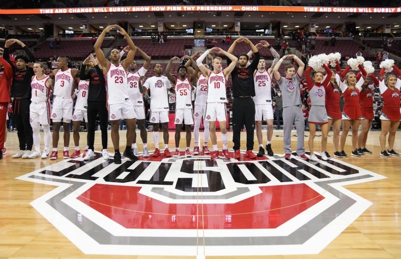 The Ohio State Buckeyes sing "Carmen Ohio" following their 85-74 win over the Towson Tigers in the NCAA men's basketball game at Value City Arena in Columbus on Wednesday, Dec. 8, 2021.

Basketball 06