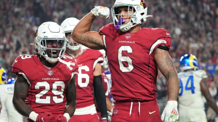 Dec 13, 2021; Glendale, Arizona, USA; Arizona Cardinals running back James Conner (6) celebrates after scoring a rushing touchdown against the Los Angeles Rams during the fourth quarter at State Farm Stadium. Mandatory Credit: Michael Chow-Arizona RepublicNfl Los Angeles Rams At Arizona Cardinals