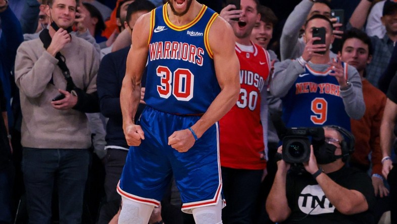 Dec 14, 2021; New York, New York, USA; Golden State Warriors guard Stephen Curry (30) reacts after a three point basket breaking the career record for total three pointers made  during the during the first quarter against the New York Knicks at Madison Square Garden. Mandatory Credit: Vincent Carchietta-USA TODAY Sports