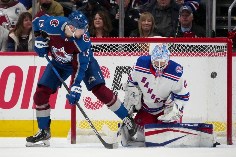 Dec 14, 2021; Denver, Colorado, USA; Colorado Avalanche right wing Valeri Nichushkin (13) attempts to score on New York Rangers goaltender Alexandar Georgiev (40) in the first period at Ball Arena. Mandatory Credit: Ron Chenoy-USA TODAY Sports