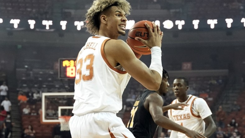 Dec 14, 2021; Austin, Texas, USA; Texas Longhorns forward Tre Mitchell (33) looks to pass the ball during the first half against the Arkansas Pine Bluff Golden Lions at Frank C. Erwin Jr. Center. Mandatory Credit: Scott Wachter-USA TODAY Sports